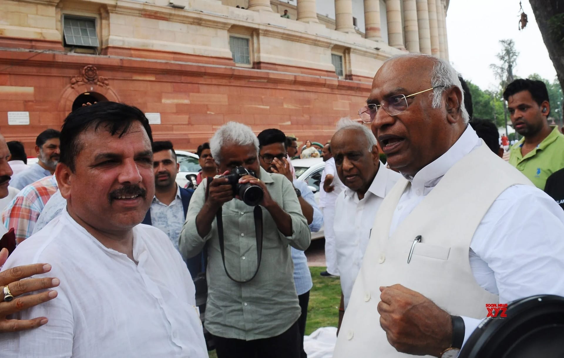 Congress President Mallikarjun Kharge with AAP MP Sanjay Singh