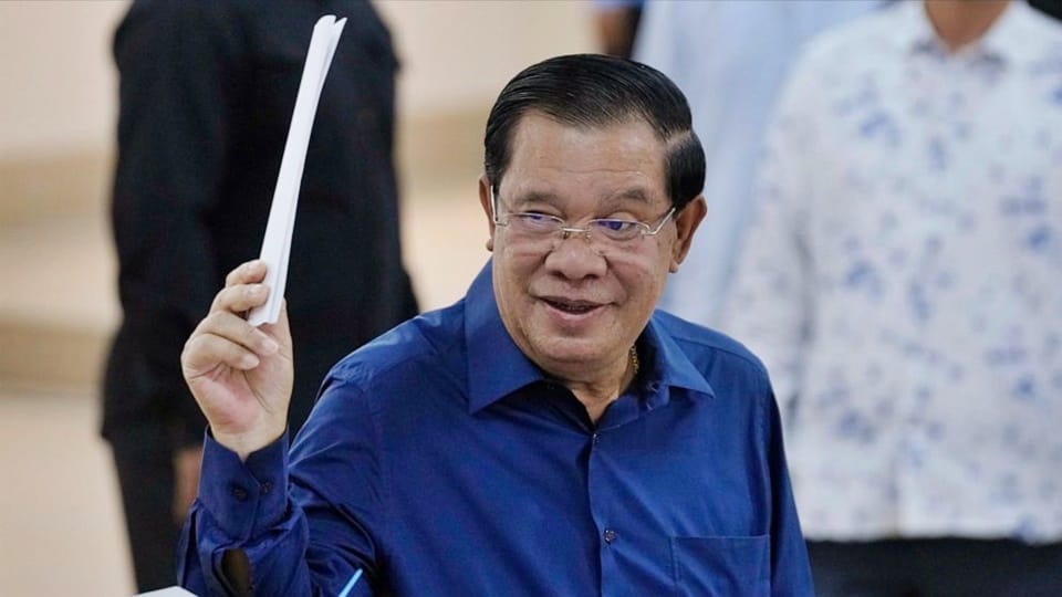 Cambodian Prime Minister Hun Sen says he will step down in three weeks and his son will succeed him