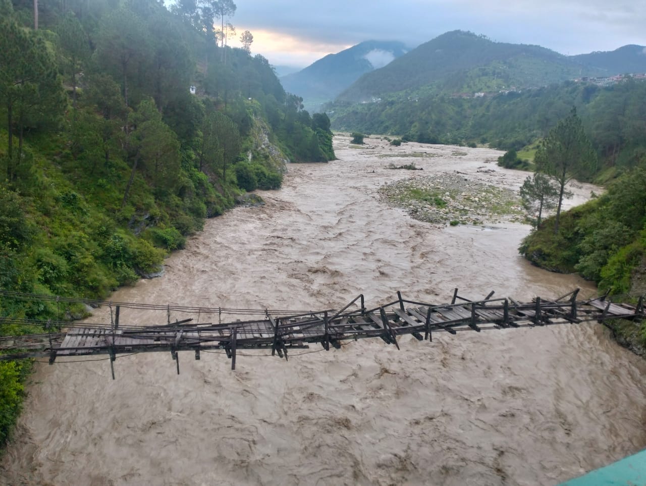 Uttarakhand Weather Rivers Overflow after Heavy rainfall and Many Houses in danger Road Closed Photos