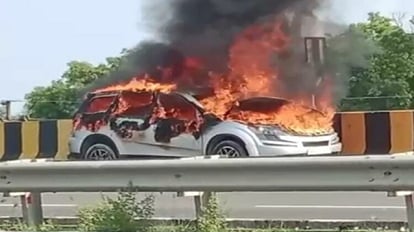 Bhadohi: हाईवे पर चलती कार बनी आग का गोला, चालक और महिला ने कूदकर बचाई जान moving car became ball of fire on varanasi prayagraj highway woman saved their lives