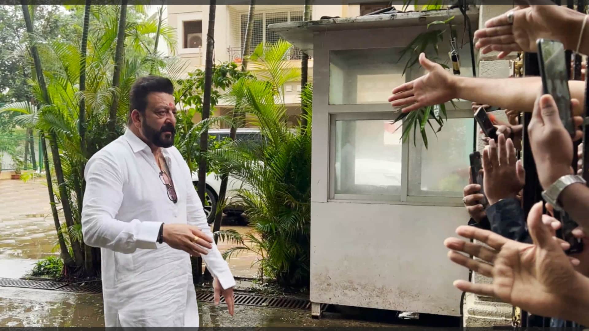 sanjay dutt greets his fans on his birthday at his residence in mumbai video goes viral on social media