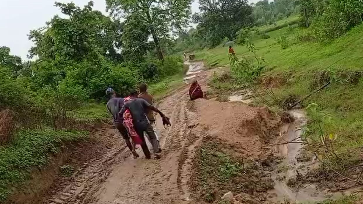 The dead body had to be carried for one km on the shoulder, a picture showing the reality of development