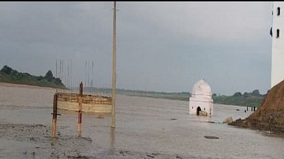 Chambal reached near the danger mark stir in coastal village Shiva temple half submerged