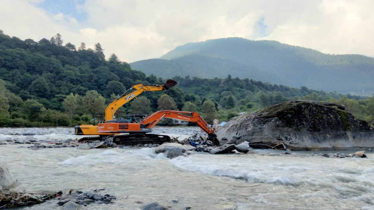 dead bodies found under a Punjab Roadways bus that was swept away by floods in Manali.