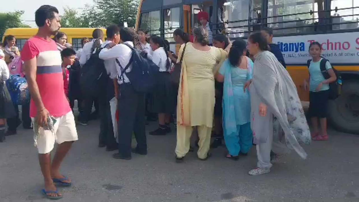 Two school buses collide with truck in Moga