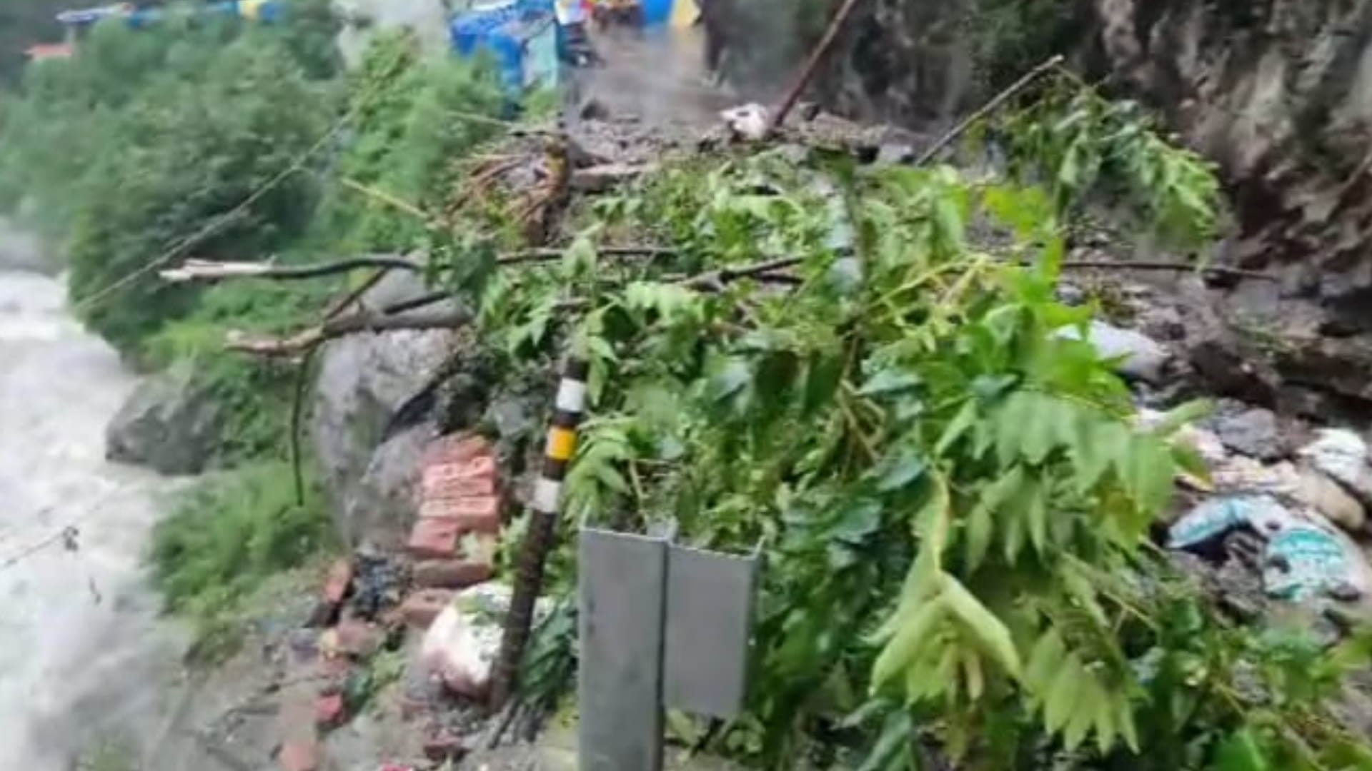 Uttarakhand Weather Today Heavy Rain Rock Broke From Hill In Gaurikund Rescue Watch Photos