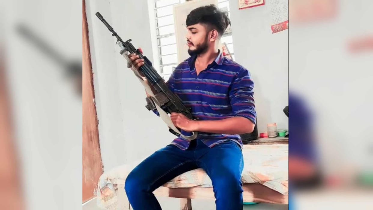Youth photo with INSAS rifle goes viral accused of threatening