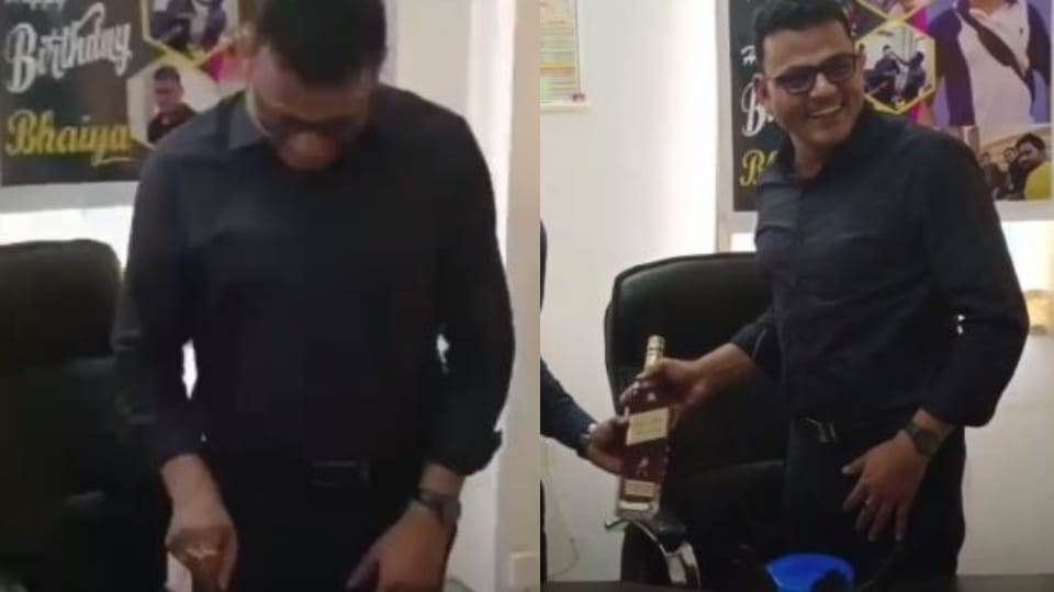 Birthday celebrated in ARTO office gifted a bottle of liquor