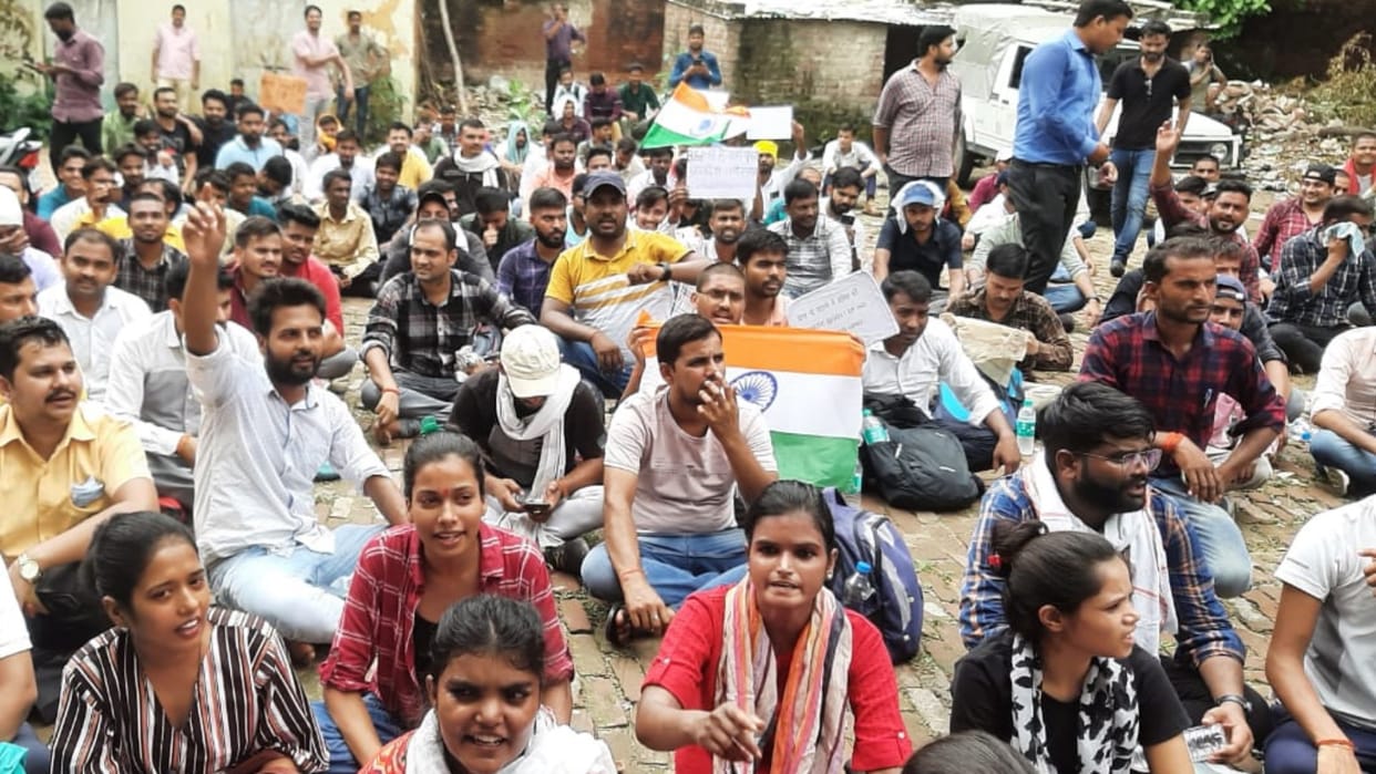 B Ed applicants protest outside Shiksha Nideshalaya in Lucknow.