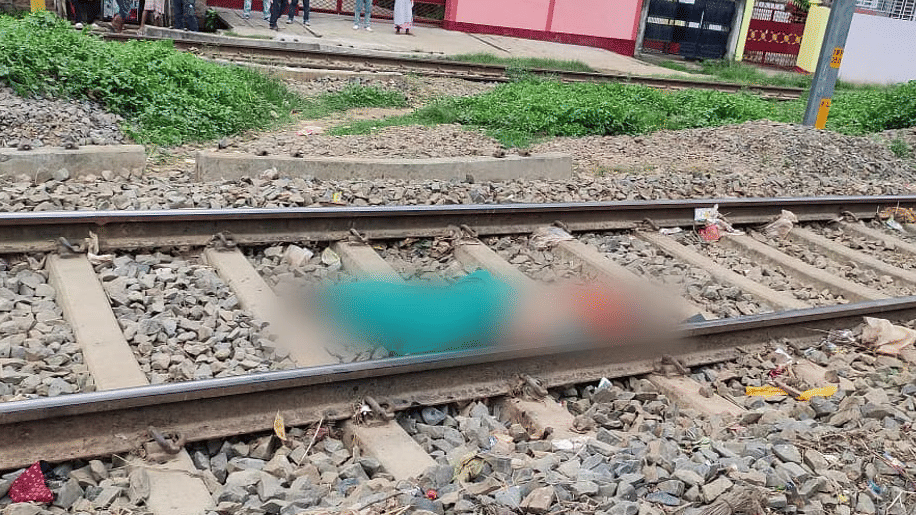 Woman jumps in front of train with two children all three die