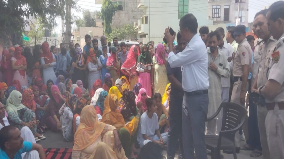 Villagers and students of deceased student village staged sit in demanding change of staff in Rewari