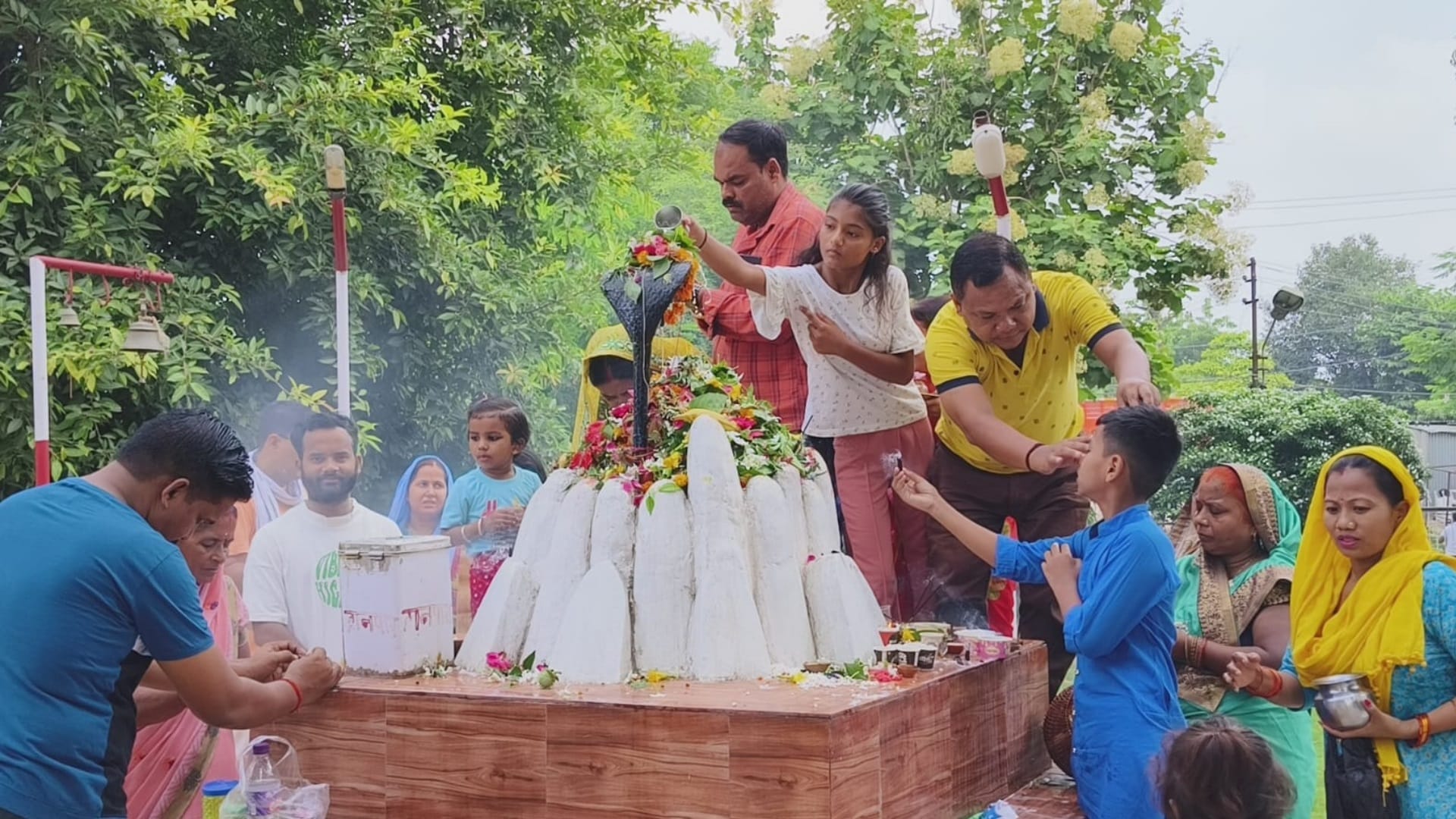 People offer prayer on Monday of Sawan in temples in Uttar Pradesh.