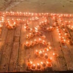 गंगा आरती में 1001 दीपों से चन्द्रयान-3 लिखा गया