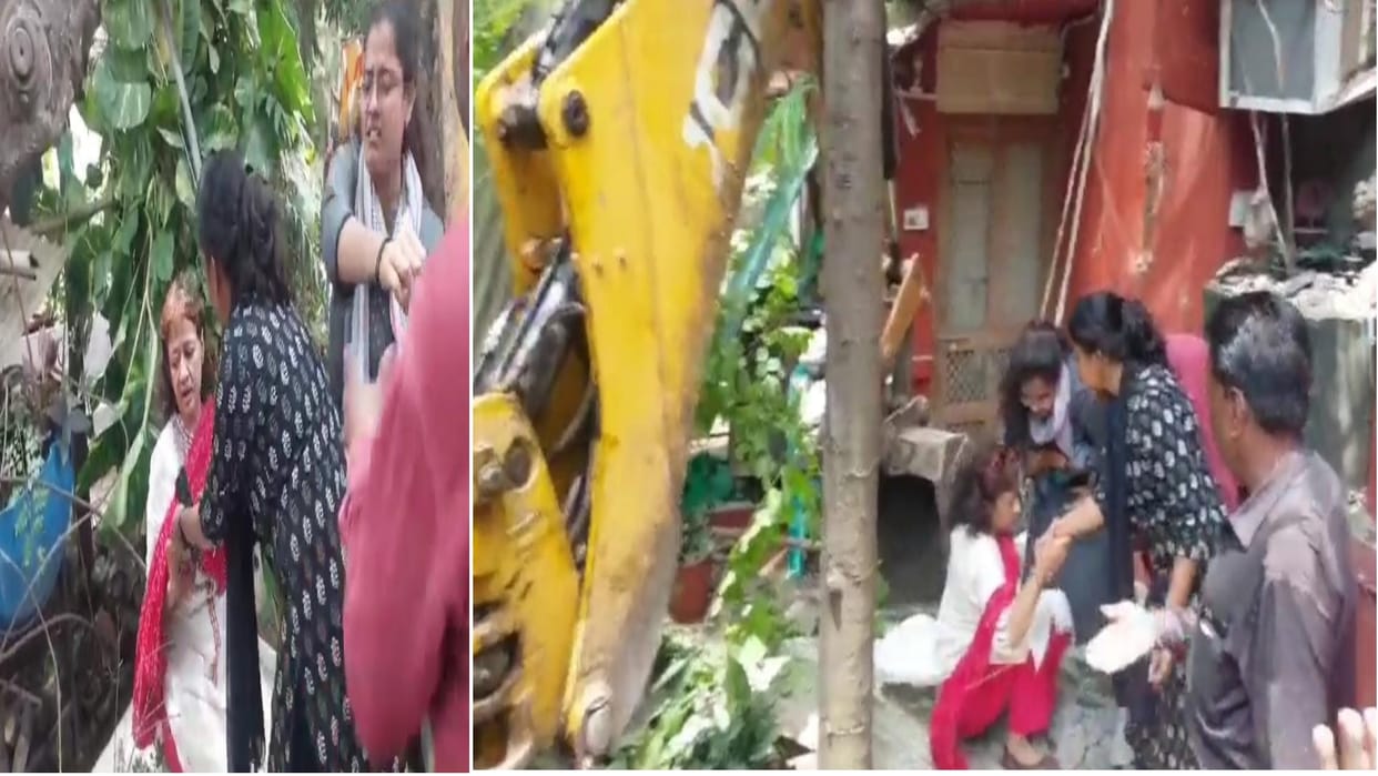 Ujjain Female professors uproar over getting the house vacated attempts to stop JCB