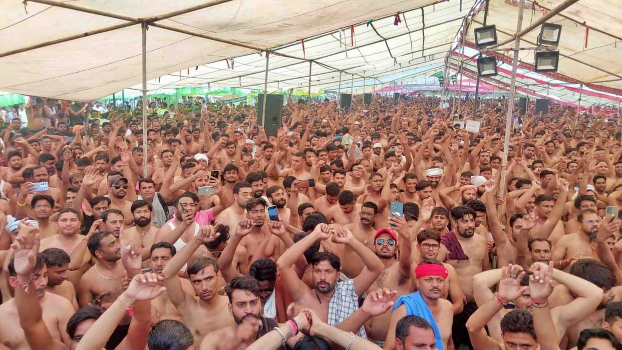 More than 25,000 power workers performed half naked in Jaipur
