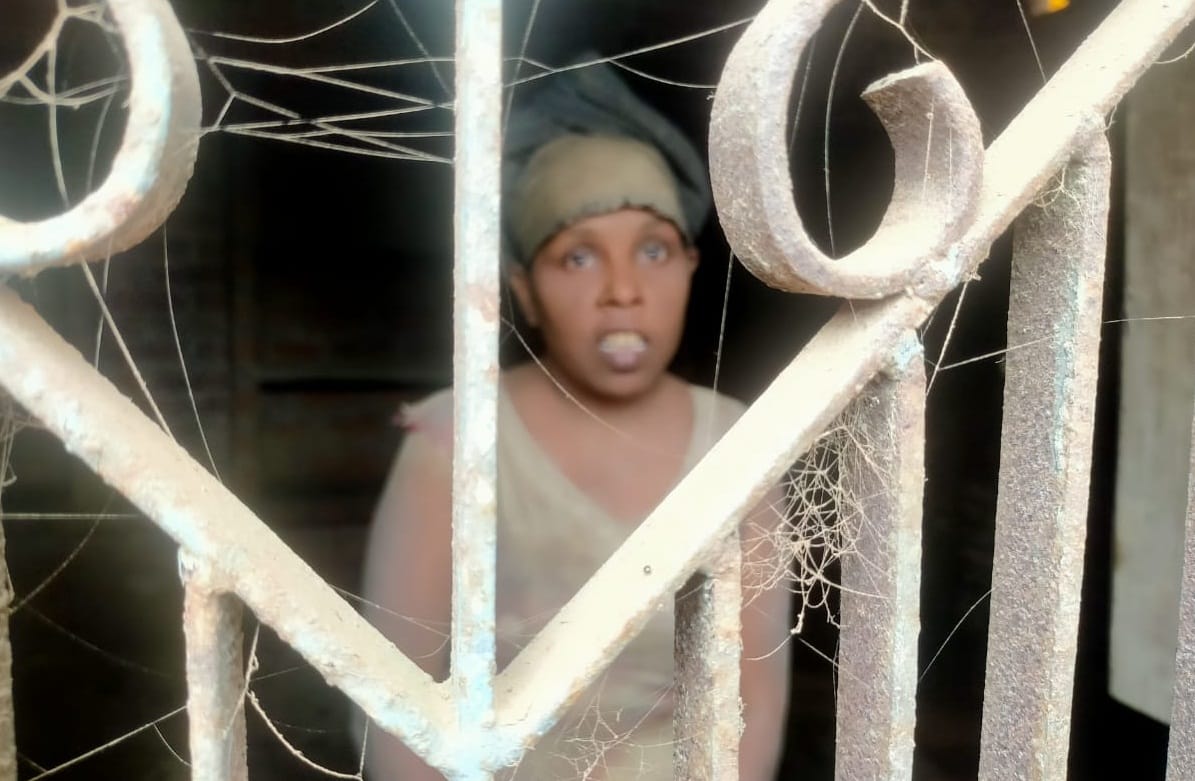 Mentally retarded woman confined in room for five years, neighbors raise daughter, Officer said treatment will