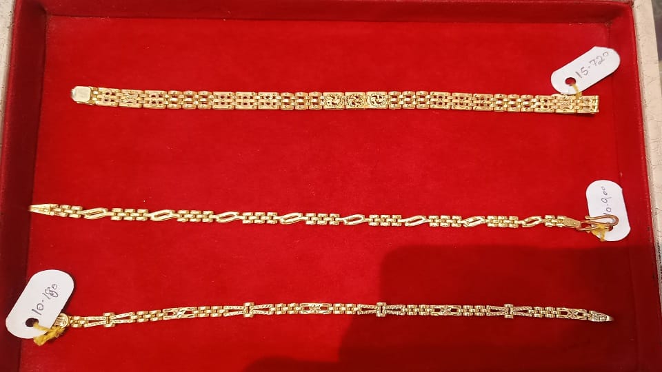 Raksha Bandhan 2023 women purchasing gold rakhis on Raksha Bandhan in Bareilly