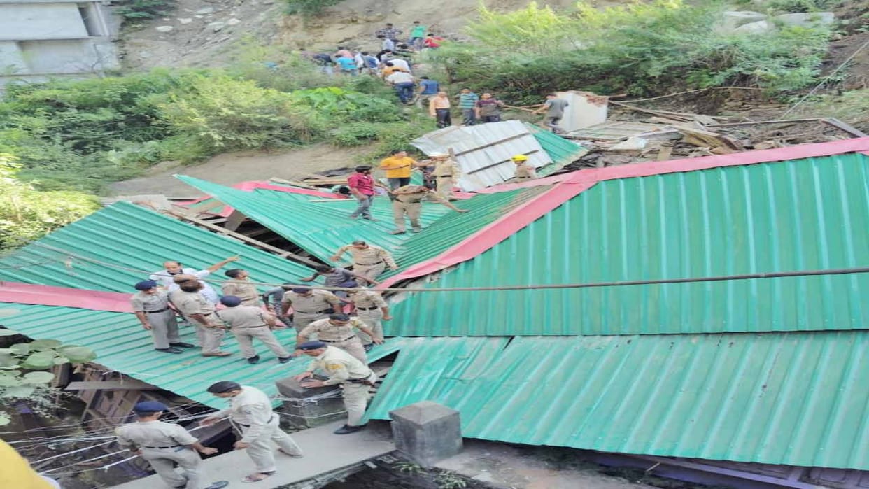 House hit by landslide in Aut village, mother and son trapped inside rescued after hard work