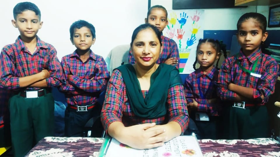Headmistress of Patiala government school Dana Mandi wearing school uniform like her students once a week