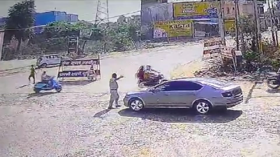Attempt made to crush home guard with car at checkpoint in Dadri, black film stuck on car with Delhi number