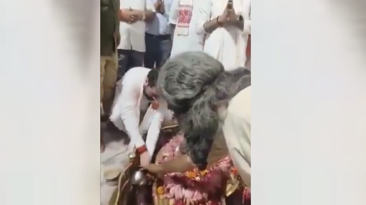 UP minister Satish Sharma washes hands near Shivling in Lodheshwar Mahadeva.