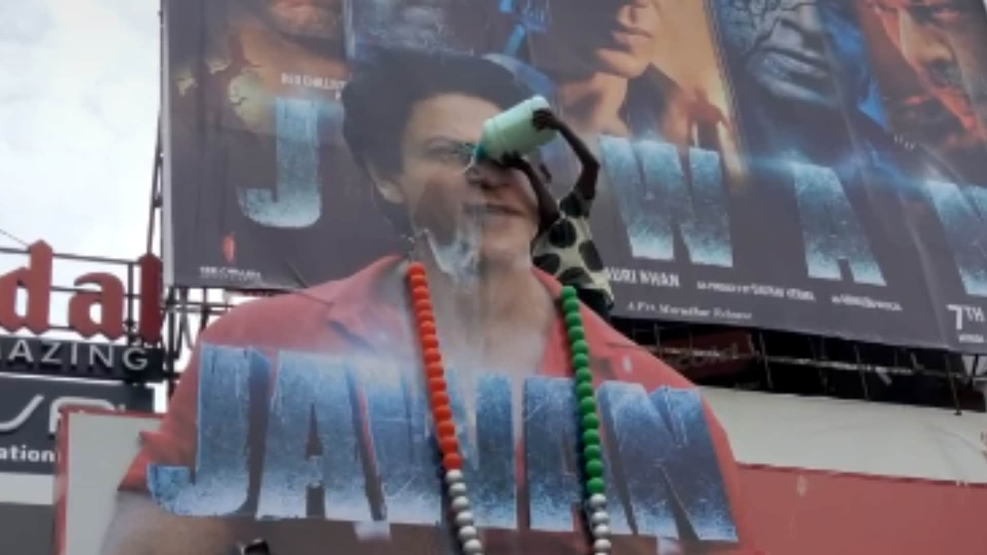 Jawan Actor Shah rukh khan Fan Poun Milk on Actor Cut-out in Hyderabad Details inside