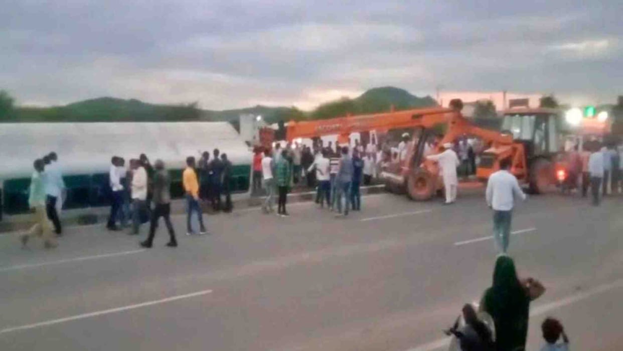 Bus hits bike and overturns in drain in Shahpura