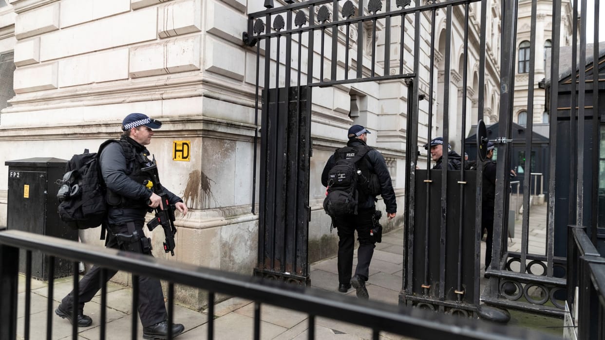 British police say they have arrested an ex-soldier facing terrorism charges who escaped from prison