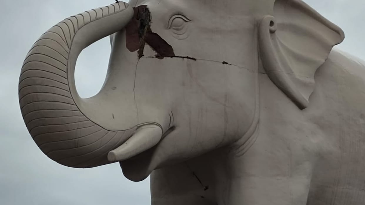 A ray of lightening falls on the statue of elephant in Ambedkar Park.