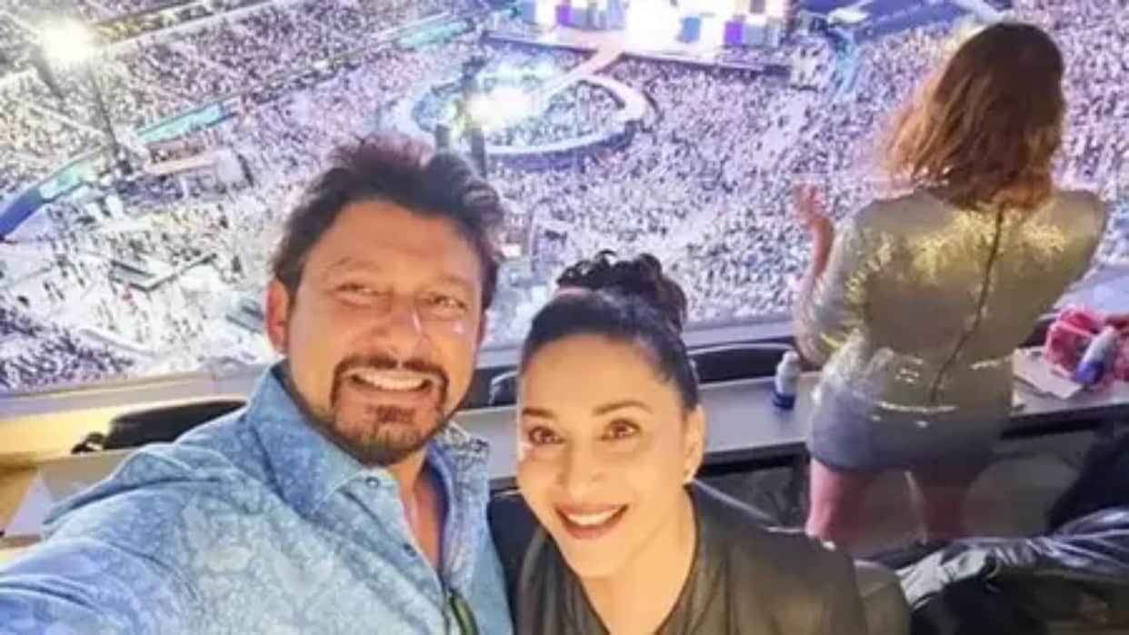 Madhuri Dixit at singer beyonce concert pose with husband doctor shriram madhav nene