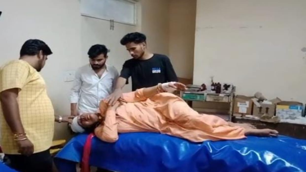 Rajasthan To get property in his name son beat his mother with stick tried to burn her alive in hut