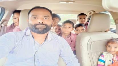 Teachers reached school with children in their car amid rain in Pilibhit