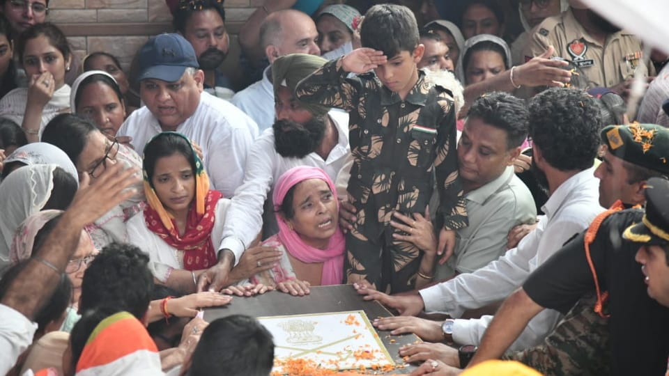 Martyr Colonel Manpreet Singh son saluted father in army dress in Mohali