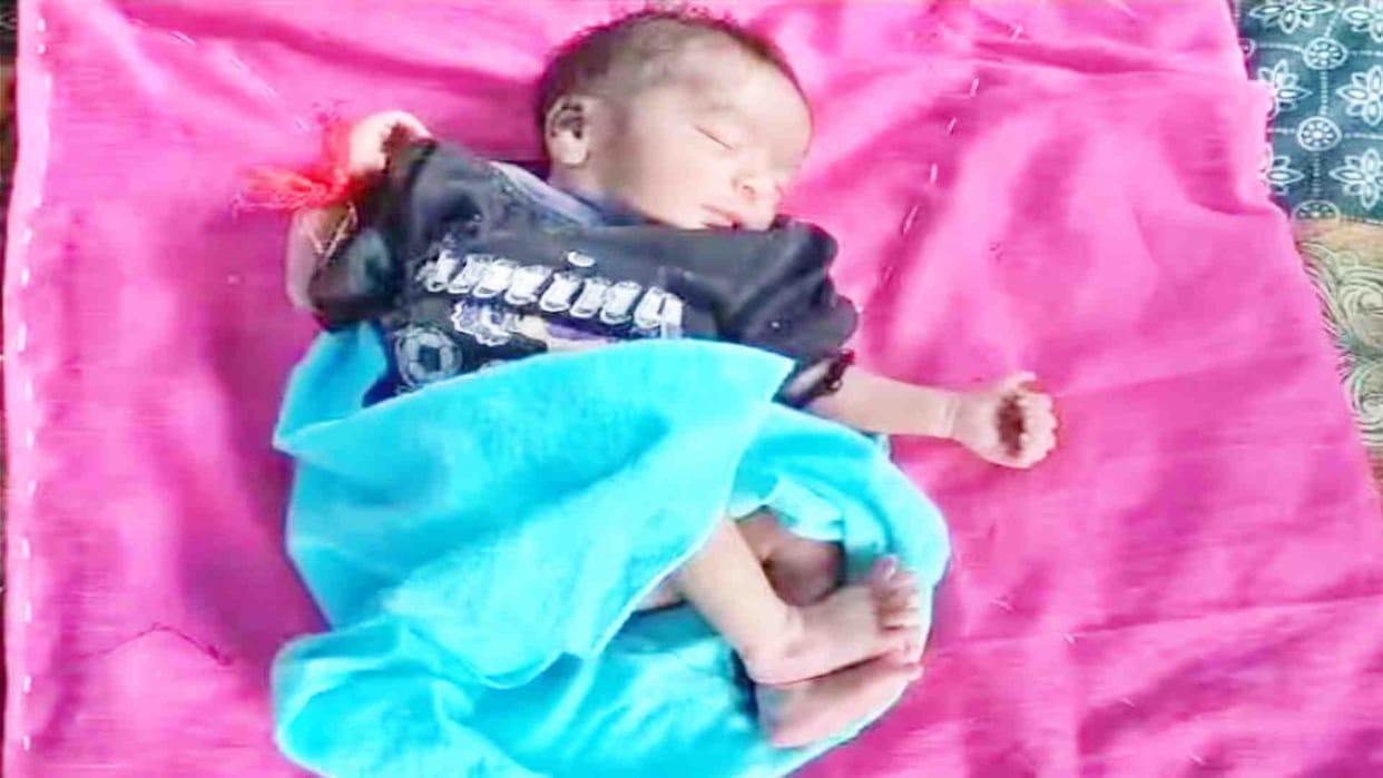 People gathered to see the newborn girl after birth in Deeg district of Rajasthan
