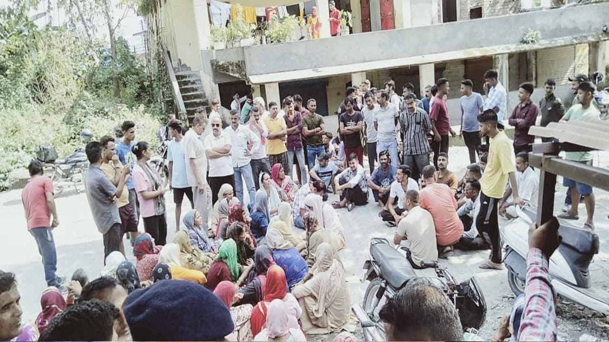 Villagers blocked the road in Puruwala demanding arrest of the accused who attacked the youth.