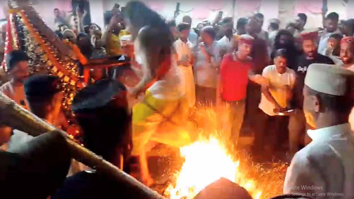 Mata's gurus passed the test of fire by walking on burning embers