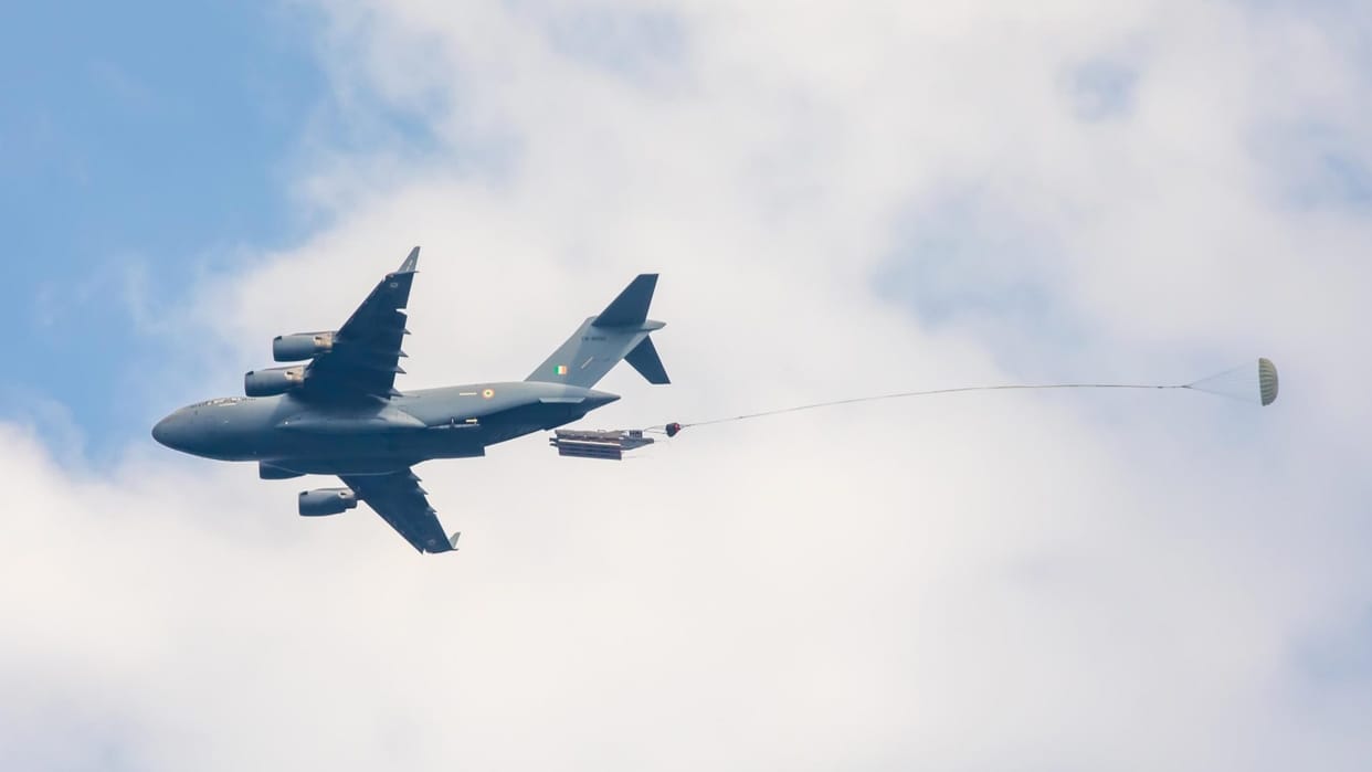 IAF C 17 aircraft launched a heavy boat from the air into the sea see video