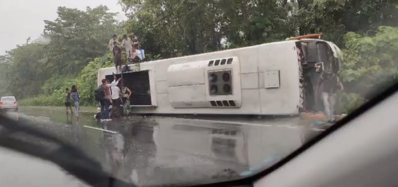 passenger bus overturned on road due to over speeding and overtaking by truck in Jagdalpur