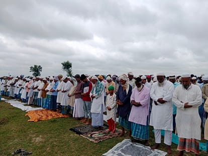 worshipers turn their palms towards the ground, special prayer Namaz outside the mosque in bihar