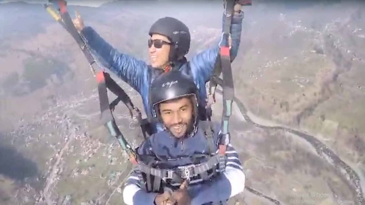 Tourists are enjoying the thrill of paragliding in Dobhi.