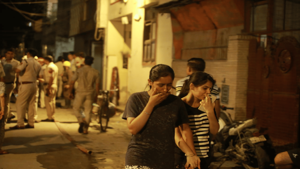 Photos of massive fire in PG of Mukherjee Nagar in Delhi