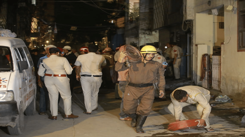 Photos of massive fire in PG of Mukherjee Nagar in Delhi