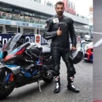 John Abraham riding bike at MotoGP 2023