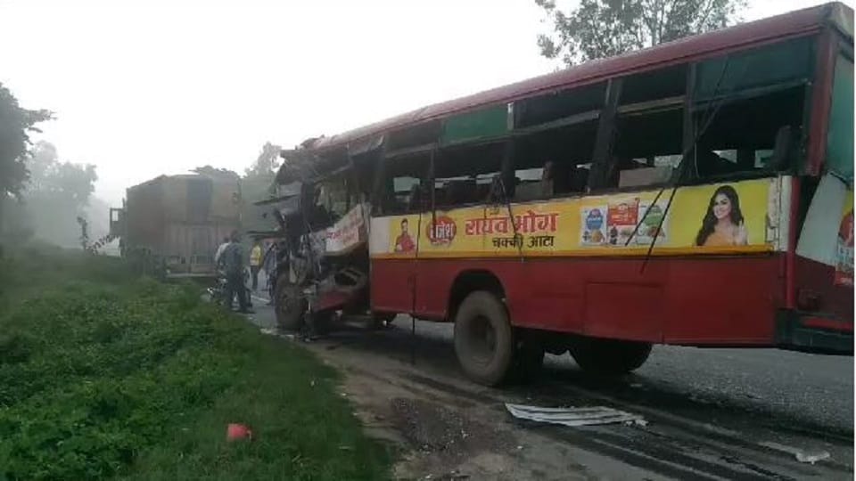 eight people injured as roadways bus collides with a truck parked on the highway