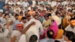 राजे के पैर छूते कांग्रेस विधायक मेवाराम जैन।