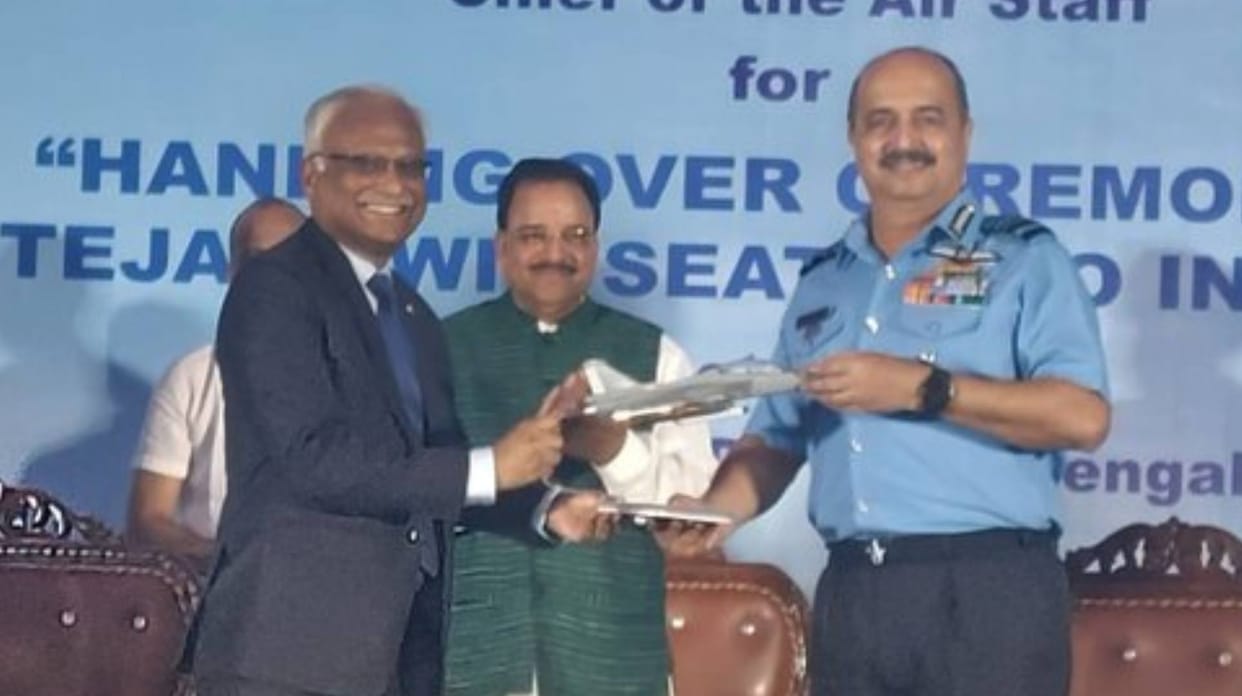 Indian Air Force chief Air Chief Marshal VR Chaudhari receives the LCA Tejas twin-seater trainer aircraft