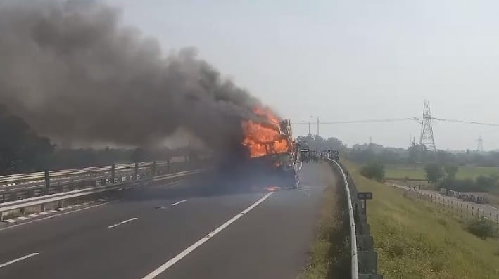 Truck loaded with wood burnt due to short circuit on expressway