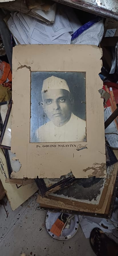 Termites on pictures of Pandit Govind Malviya, former Prime Minister Pandit Jawahar Lal Nehru, Mother Teresa