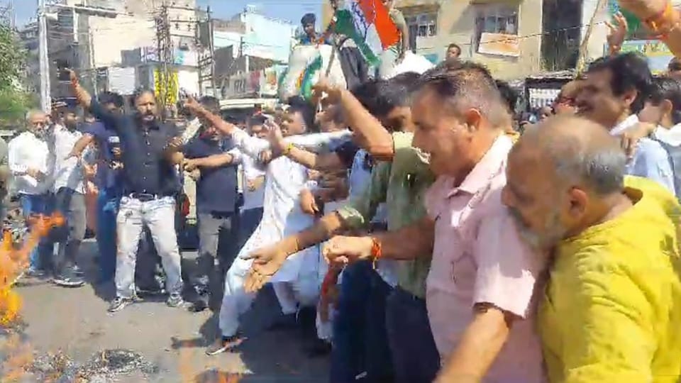 jammu kashmir Congress protests against BJP over Rahul Gandhi Comparison wih Ravana poster