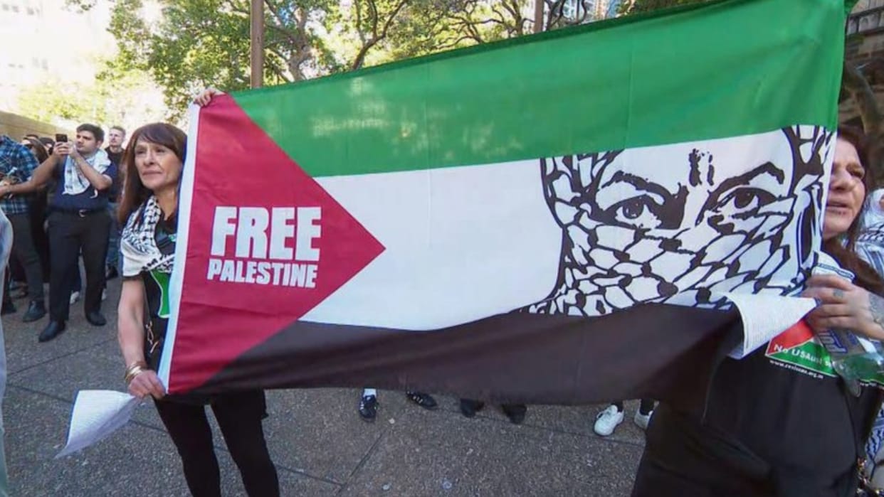Hundreds gather in Sydney for pro-Palestine protest as Opera House lights up in support of Israel